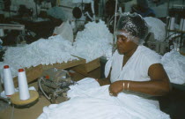 Workers in garment factory in Free Zone making t shirts.