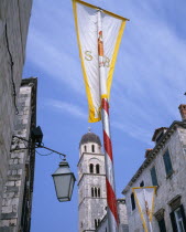 Vatican City flags on Placa and view of Franciscan Monastery