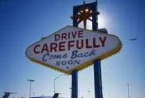 USA, Nevada, Las Vegas, Drive Carefully Come Back Soon sign on the Strip next to McCarran Airport