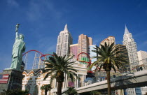 USA, Nevada, Las Vegas, New York New York hotel and casino on the strip, with scale models of NYC skyline and elevated walkway to MGM Grand.