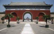 Temple Of Heaven entrance gateway with the temple in the distance