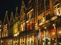 Grand Market. Shops and restaurant facades illuminated at night.