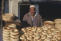 Baker selling bread from a street stall
