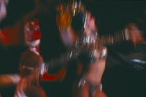 Club Tropicana dancers in blurred movement through long camera exposure
