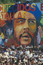 Crowd in front of  giant Che Guevara painting at 35th Anniversary of The Revolution