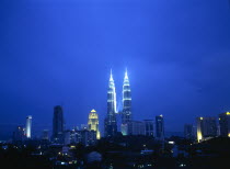 Petronas Towers and skyline at dusk