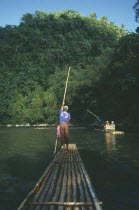 Tourists being taken on rafts down the river