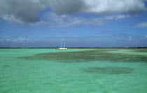 The Nylon Pool with yacht anchored on the horizon