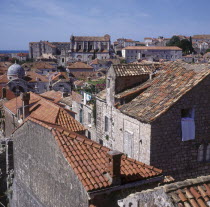 View over rooftops with red tiled rooves