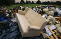 Environment, Rubbish, Sofa left among other rubbish in a public park during council workers strike in Liverpool, England.