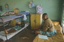 Girls in dormitory of boarding school.