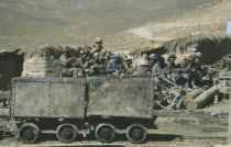 Miners chewing coca leaves before a shift at Candelaria Mine.