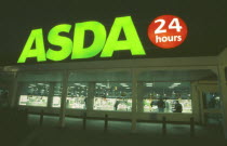 Asda twenty four hour supermarket. Large sign lit up at night  Brighton Marina East Sussex