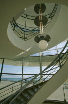De La Warr Pavilion. Interior of the helix like spiral staircase and Bauhaus globe lamps.Art Deco Building built by the Earl Of De La Warr in 1935 Designed by Erich Mendelsohn and Serge Chermayeff Re...