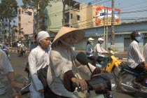Buddhist monks riding a motorbike