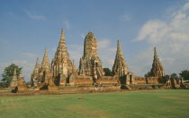 General view of the old city ruins  scattered among grassy fields.