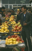 Fruit sellers at market.