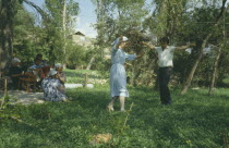 Chechen man and Avar girl dancing.