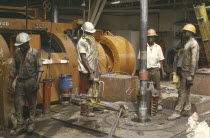 Workers on oil rig.