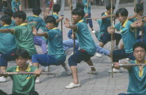 Students attending kungfu school.