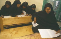 Ali Osman Primary School.  Girls at desks in classroom.