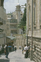 Via Dolorosa narrow street lined with shops. Aka The Way of Suffering. Said to be the route that Jesus carried his cross to the crucifixtion site