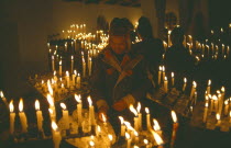 Ice Festival of Qoyllur Riti.  Pre Columbian in origin but of Christian significance today.  Worshippers at candlemass ceremony.Cuzco Cusco