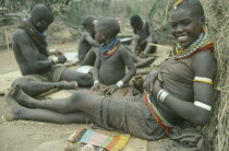 Karamojong girl from the Mathenico clan wearing traditional bead jewellery and with beadwork to be worn by unmarried girls. Pastoral tribe of the Plains Nilotes group related to the Masi