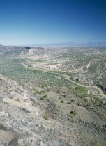 View over desert landscape with th Rio Grande river near BAndalier National Monument