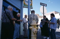 USA, New Mexico, Santa Fe, Jazz band playing outside Evangelos cocktail lounge.