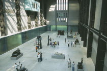 Tate Modern. View over the Old Turbine Hall with modern sculpture exhibitsArt Galleries