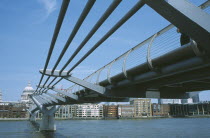 View along the underside of the Millennium footbridge over the River Thames