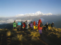 Trekkers gathered to watch the sunrise over the Annapurna mountain range.