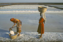 Woman gathering salt
