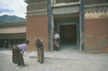 Labrang Monastery.  Three women pilgrims