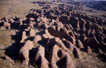 Aerial view over striped rock towers