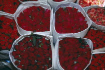 Close up of bunches of red Roses on display at the Flower Market