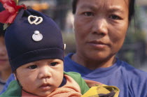 Close up portrait of Karen refugee mother and baby