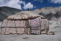 Khirgiz Yurts in barren mountain landscape