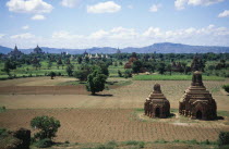 Two Temples in a field with others seen in the distance