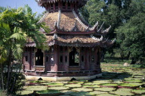 Ancient City Pagoda built on a lily pond