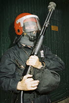 Basque riot policeman holding gun during the festival of El Alarde on 8 September