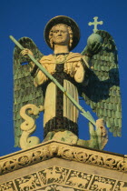 San Michele in Foro.  Detail of carved archangel figure.