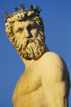 Piazza della Signoria.  Detail of statue of Neptune showing head and upper torso.