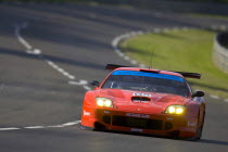 Number 65 Red Prodrive Ferrari 550 Maranello race car with British flag on bonnet  exiting the Porsche Curves.motor racing Automobile French Hood Western Europe Automotive Automvil Cars European Mot...