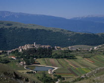 General view of the high plateau village area East of l Aquila town. Showing strip farming