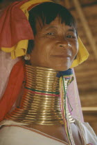 Portrait of Paduang  long neck  woman  metal rings.