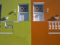 Bo Kapp District. Chiappini Street. Brightly painted houses joined together with detail of doors.Typical architecture.The Cape Muslim area of Cape Town Moslem Colorful