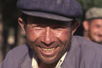 Head and shoulders portrait of Tajik man