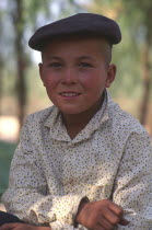 Portrait of young Tajik boy